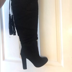 Knee high black boots